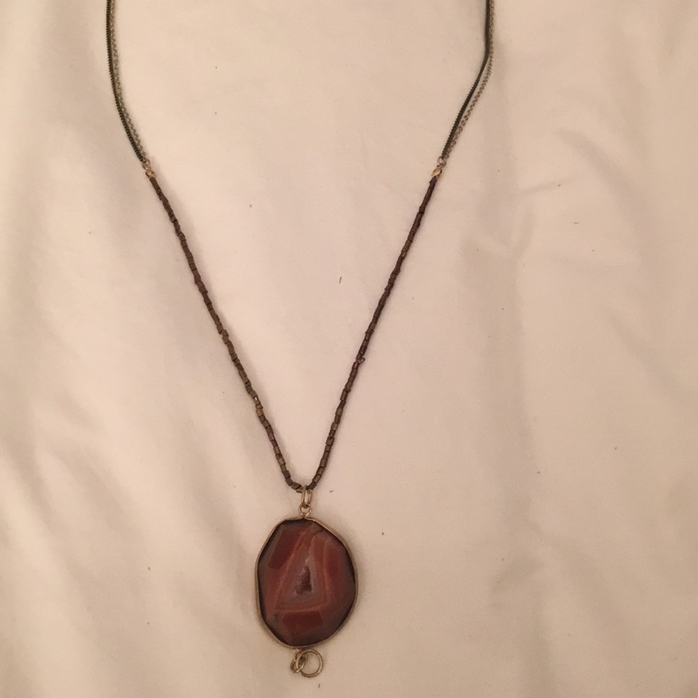 Maroon stone pendant on dark gold necklace!